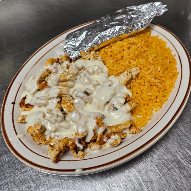Arroz Con Pollo.